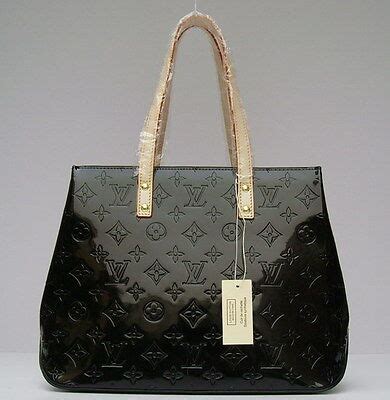 selling fake bag on ebay|ebay counterfeit purses.